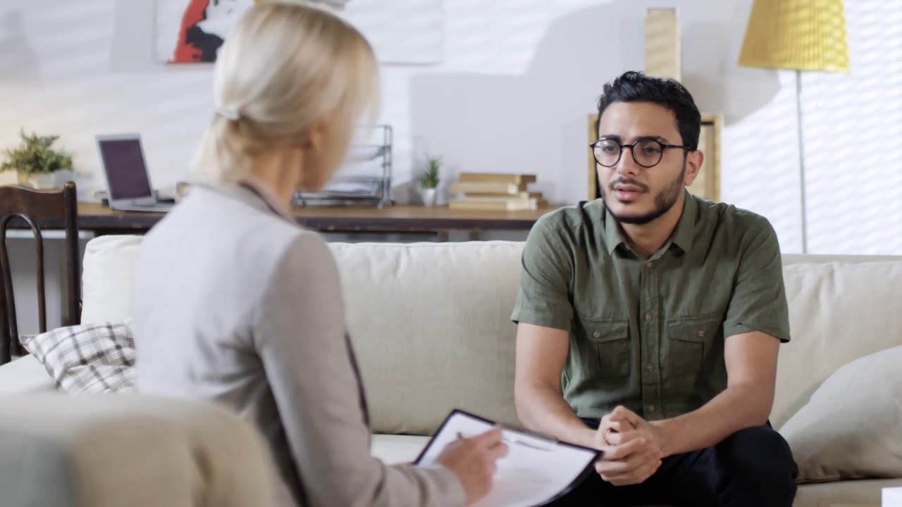Young man consulting a therapist